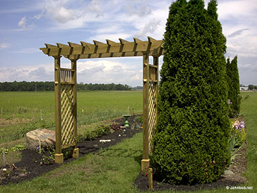 Custom Built Arbor in flower garden