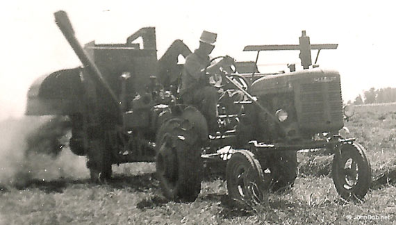 Farmall AC combine harvesting clover seed
